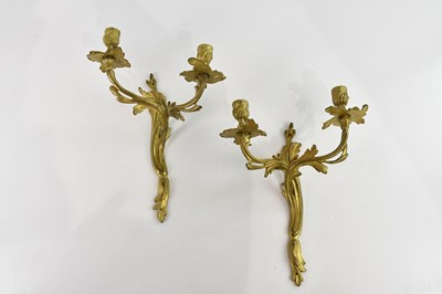 Lot 1309 - A pair of 19th century ormolu style twin...