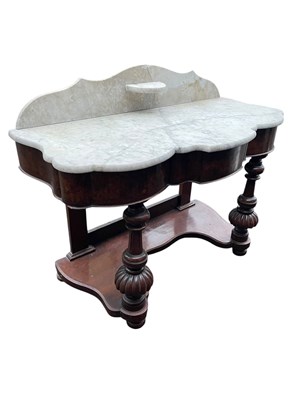 Lot 217 - A Victorian walnut serpentine fronted Duchess...