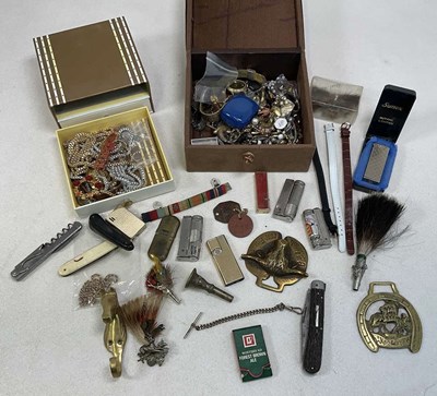 Lot 1269 - A group of costume jewellery, various badges...