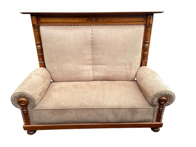 Lot 1117 - A large stained beech and pine settle with...