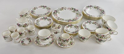 Lot 1516 - WEDGWOOD; a 'Hathaway Rose' letter part dinner...