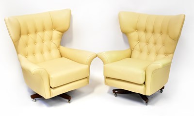 Lot 6 - G-PLAN; a pair of Blofeld-style cream leather...
