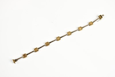 Lot 230 - A 9ct white and yellow gold bracelet, length...