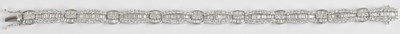 Lot 1341 - An 18ct white gold and diamond set line...