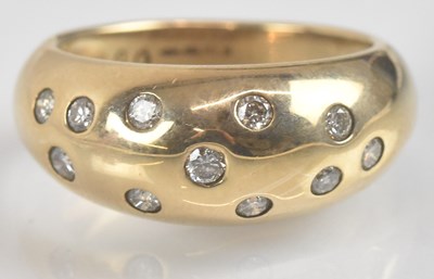 Lot 1309 - A 9ct yellow gold diamond set ring, with...