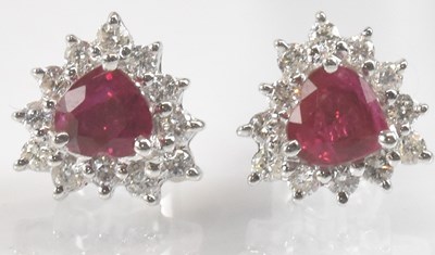 Lot 1386 - A pair of 18ct white gold ruby and diamond...
