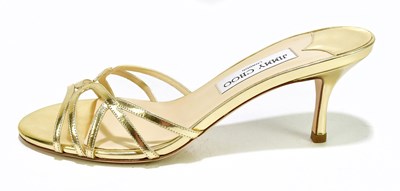 Lot 795A - JIMMY CHOO; a pair of unworn gold leather...