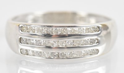 Lot 1287 - An 18ct white gold diamond ring, set with...