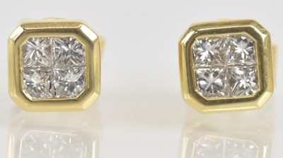 Lot 1390 - A pair of 18ct yellow gold diamond ear studs,...