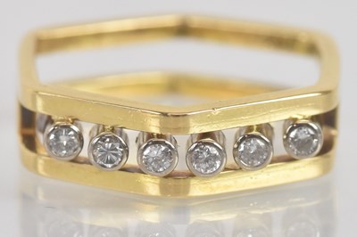 Lot 1267 - An unusual 18ct yellow gold diamond set...