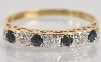 Lot 1333 - A 9ct yellow gold sapphire and diamond ring,...