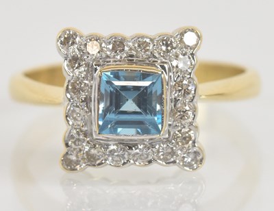 Lot 1252 - An 18ct yellow gold aquamarine and diamond...