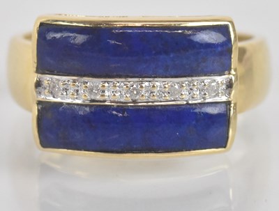 Lot 1330 - A 14ct yellow gold diamond and lapis lazuli...