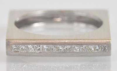 Lot 1277 - An unusual 18ct matte finish white gold ring...