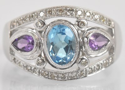 Lot 1328 - A 9ct white gold blue topaz amethyst and...