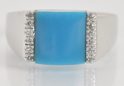 Lot 1329 - A 9ct white gold diamond and simulated...
