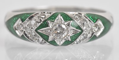 Lot 1282 - An 18ct white gold diamond and green enamel...