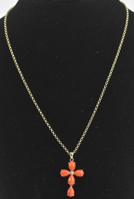 Lot 1482 - A 14ct yellow gold and pear shaped coral...