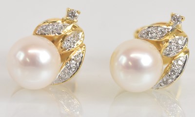 Lot 1412 - A pair of 18ct yellow gold diamond and...