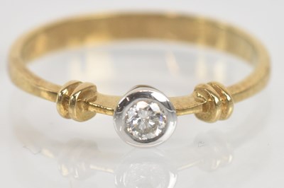 Lot 1313 - A 9ct yellow gold diamond solitaire ring, the...