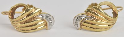 Lot 1409 - A pair of 9ct yellow gold screw back earrings...