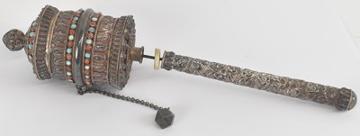 Lot 1146 - A Tibetan white metal turquoise and coral set...