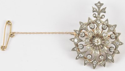 Lot 1263 - A late Victorian yellow metal diamond set...