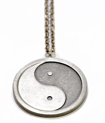 Lot 1405 - JORGEN JENSON; a pewter yin-yang pendant, on...