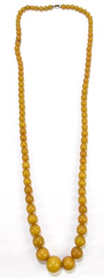 Lot 1354 - An amber style bead necklace, approx 91cm.