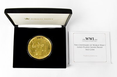 Lot 648 - A gold-plated silver proof commemorative coin,...