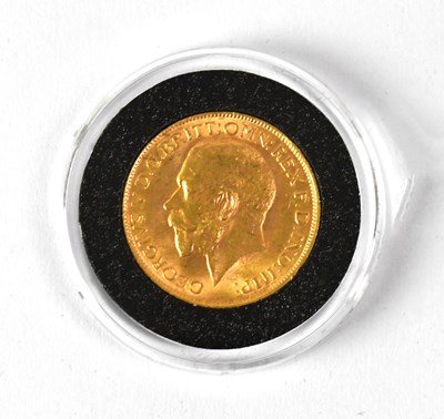 Lot 709 - A George V full sovereign, 1911, first year of...
