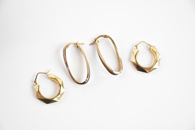 Lot 294 - Two pairs of 9ct yellow gold hoop earrings,...