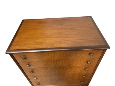 Lot 16 - A mid century teak pillar chest of six drawers,...