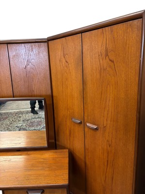 Lot 7 - JOHN J HERBERT FOR YOUNGER; a teak five piece...