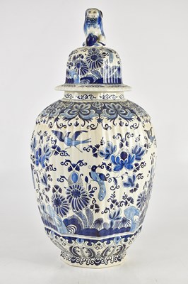 Lot 1553 - DELFT; an 18th century style temple jar and...