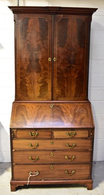 Lot 117a - A George III mahogany bureau bookcase, the top...