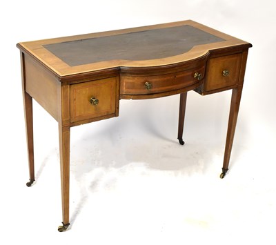 Lot 80a - A mahogany leather-topped desk, with large bow-...