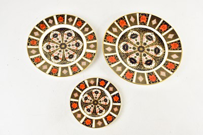 Lot 1506 - ROYAL CROWN DERBY; three plates, diameter 10",...
