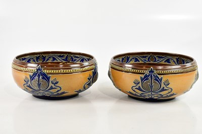 Lot 1419 - MARK V MARSHALL FOR ROYAL DOULTON; a pair of...