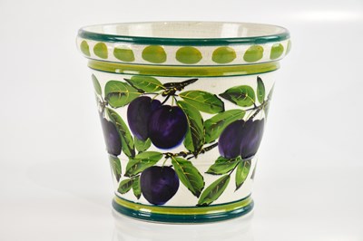 Lot 1552 - WEMYSS WARE; a jardinière decorated with plums,...