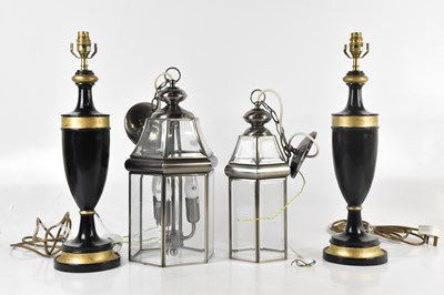 Lot 1318 - A pair of modern black painted table lamps,...