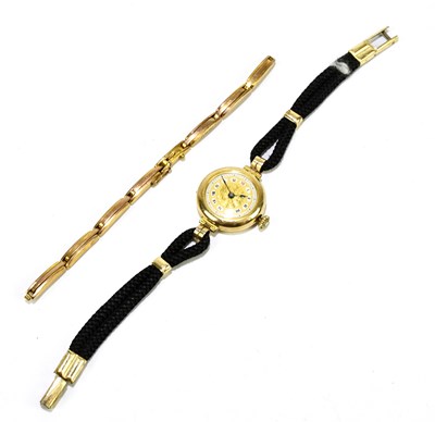 Lot 1729 - A lady's 9ct yellow gold wristwatch, the...