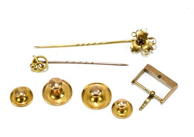 Lot 1445 - A Victorian yellow metal stick pin, set with...