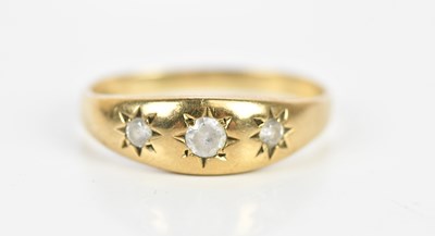 Lot 192 - A 9ct yellow gold dress ring, set with three...