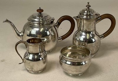 Lot 1014 - A George VI hallmarked silver four piece tea...