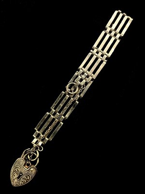 Lot 1191 - A 9ct yellow gold four bar gate link bracelet...