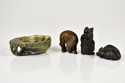 Lot 106 - Three Chinese netsukes including a rosewood...