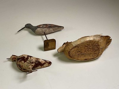 Lot 22 - Three model birds, a decoy duck, one painted...