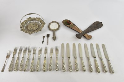 Lot 1382 - An Eastern white metal filigree decorated hand...