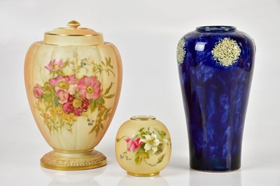 Lot 1621 - ROYAL WORCESTER; a blush ivory vase and cover,...